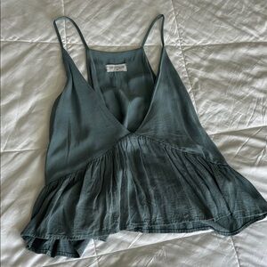 Vestique Green Asymmetrical Peplum Camisole